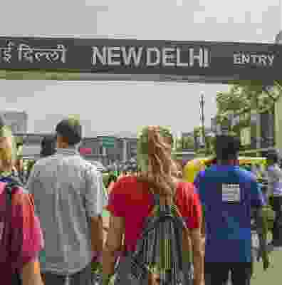 Travellers entering the New Delhi city walk.