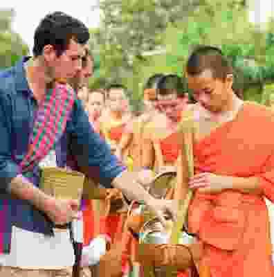 Travellers with buddhist monks