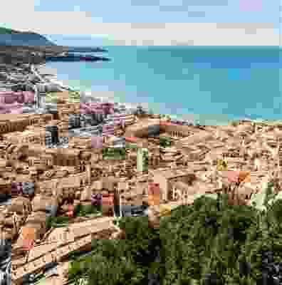 Overhead view of the city and coast of Cefalu.